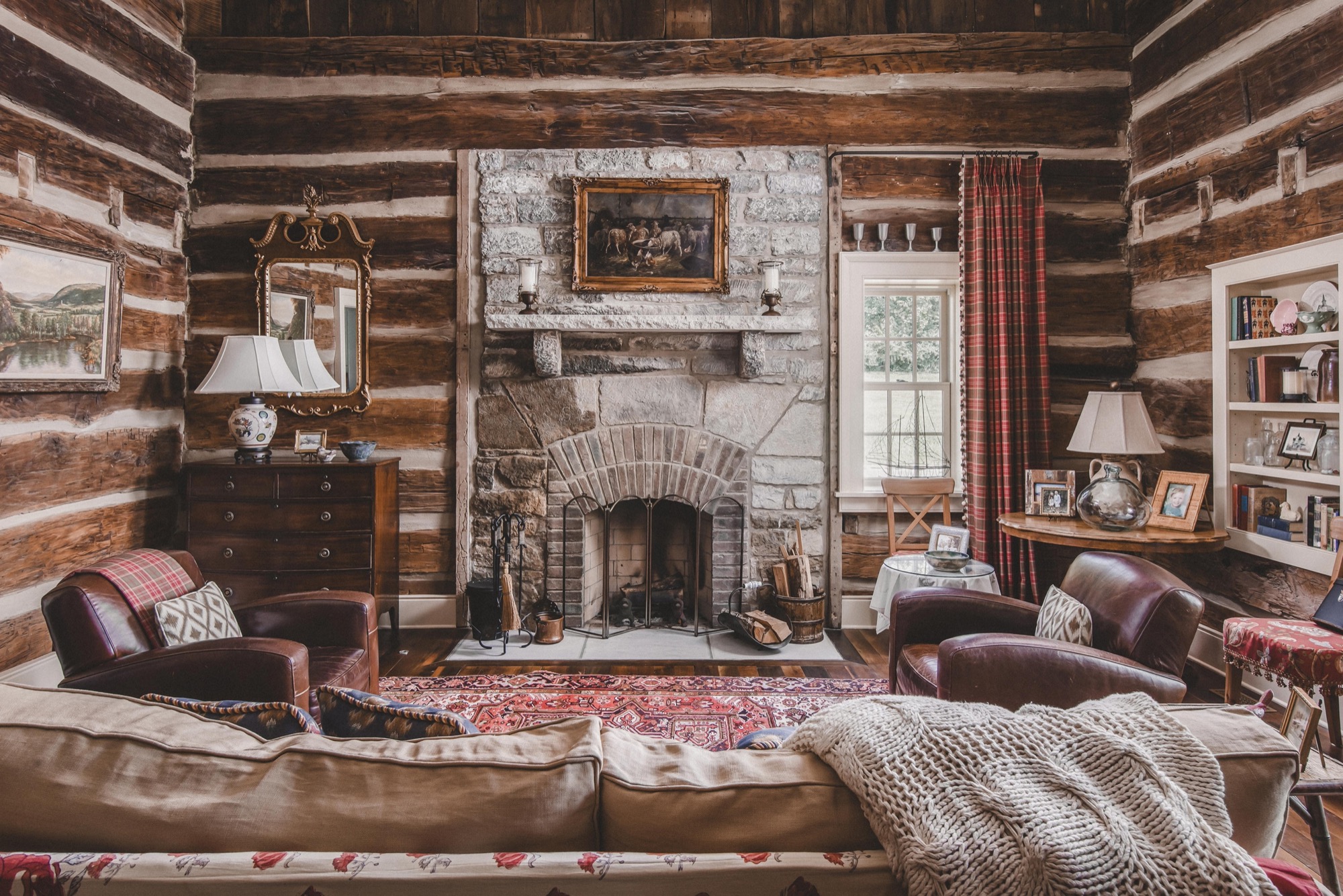 Rugged living room with log walls